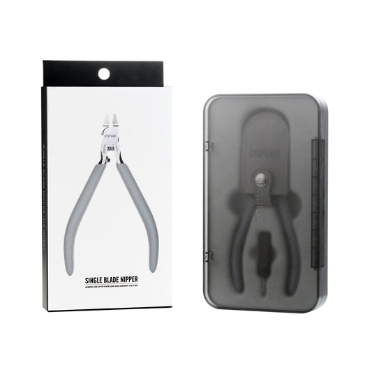 Single blade nipper with packaging and black case on a white background